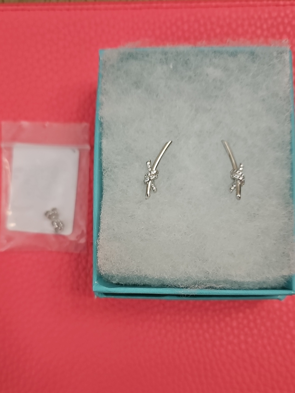 Sterling Silver Knot Drop Earrings in Silver